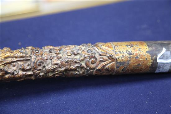 A Chinese gilt lacquered wood temple carving, 17th century possibly Zitan, total length 84cm